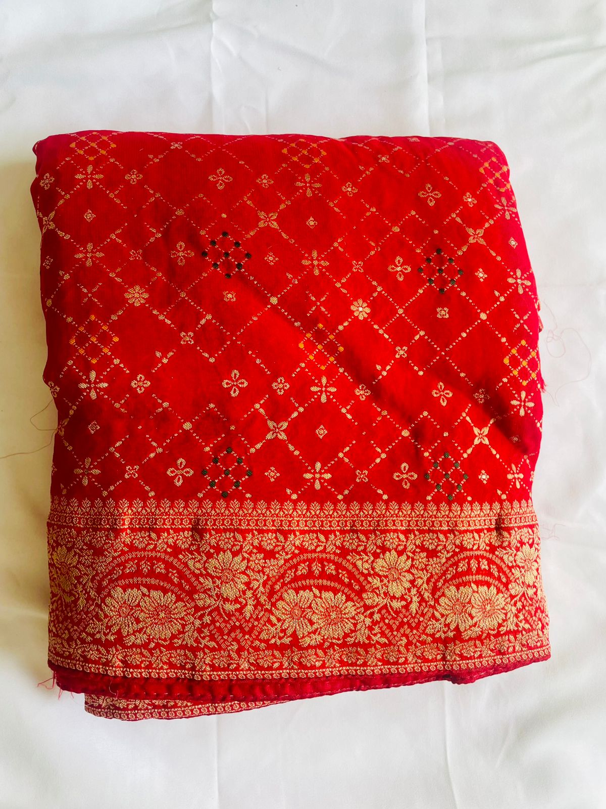 Red Khaddi Georgette Bandhani Saree.