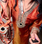 Rust Orange Mirror Work Kurta Set with Pants & Potli