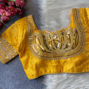 Heavy milan silk with embroidery work yellow color blouse.