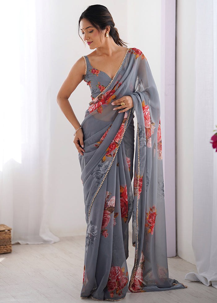 Gray color georgette saree with printed work and pearl border