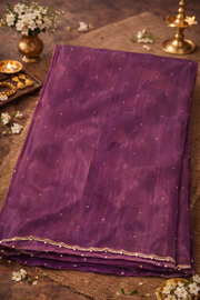 Purple Soft Silk Saree with Delicate Embellishments.