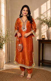 Rust Orange Mirror Work Kurta Set with Pants & Potli