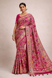 Rani pink patola silk saree with meenakari zari weaving work.