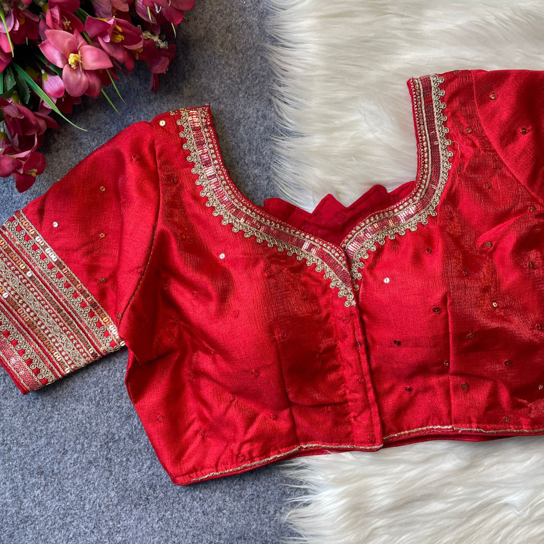Heavy milan silk with embroidery work red color blouse.