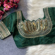 Heavy milan silk with embroidery work green color blouse.