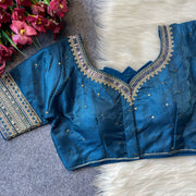 Heavy milan silk with embroidery work blue color blouse.