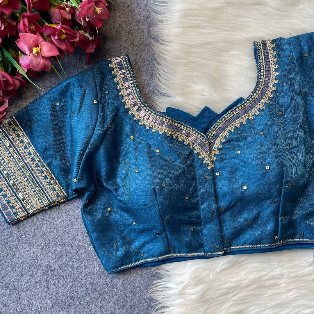 Heavy milan silk with embroidery work blue color blouse.