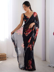 Black color georgette saree with printed work and pearl border