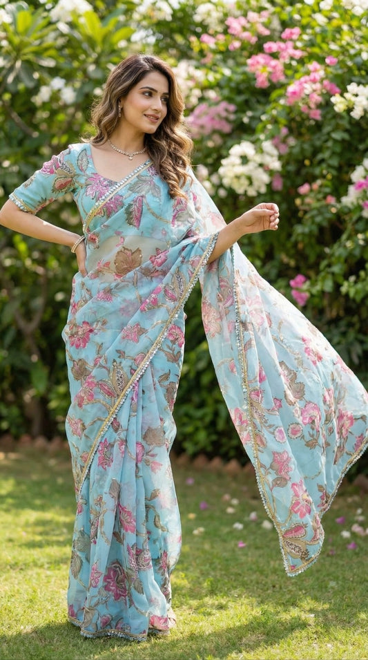 Sky blue georgette saree with Sequence work and mirror work border