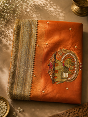 Royal Orange Silk Saree with Intricate Gold Detailing