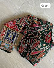 Green pure crepe silk readymade blouse with position printed work.