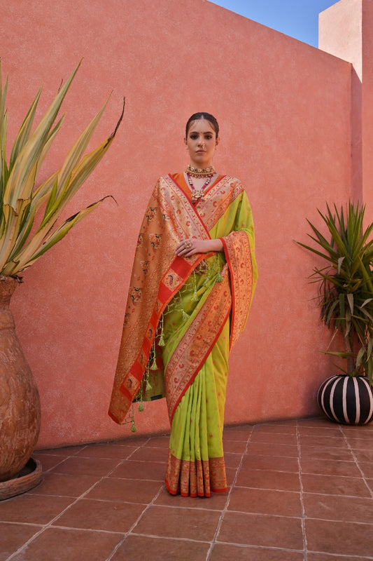Parrot green premium banarasi silk paithani saree with zari weaving work.