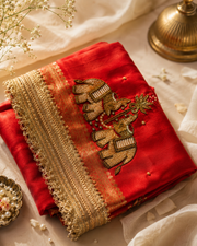 Crimson Red Tissue Silk Saree with Intricate Gold Handwork