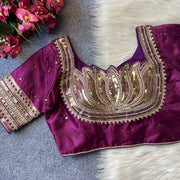 Heavy milan silk with embroidery work magenta color blouse.