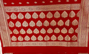 Pure Banarasi Khaddi Georgette Saree in Deep Red with Gold Zari Motifs.