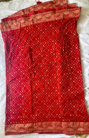 Red Khaddi Georgette Bandhani Saree.