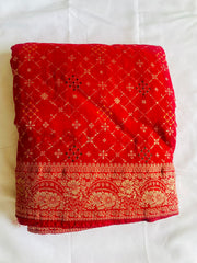 Red Khaddi Georgette Bandhani Saree.