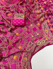 Rani pink patola silk saree with meenakari zari weaving work.