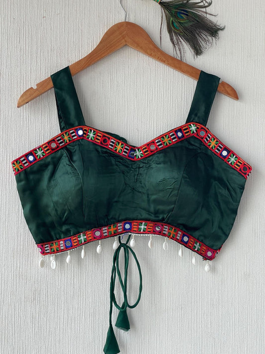 Dark green gajji silk readymade blouse with embroidery and mirror work.