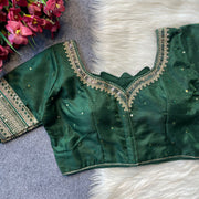 Heavy milan silk with embroidery work green color blouse.