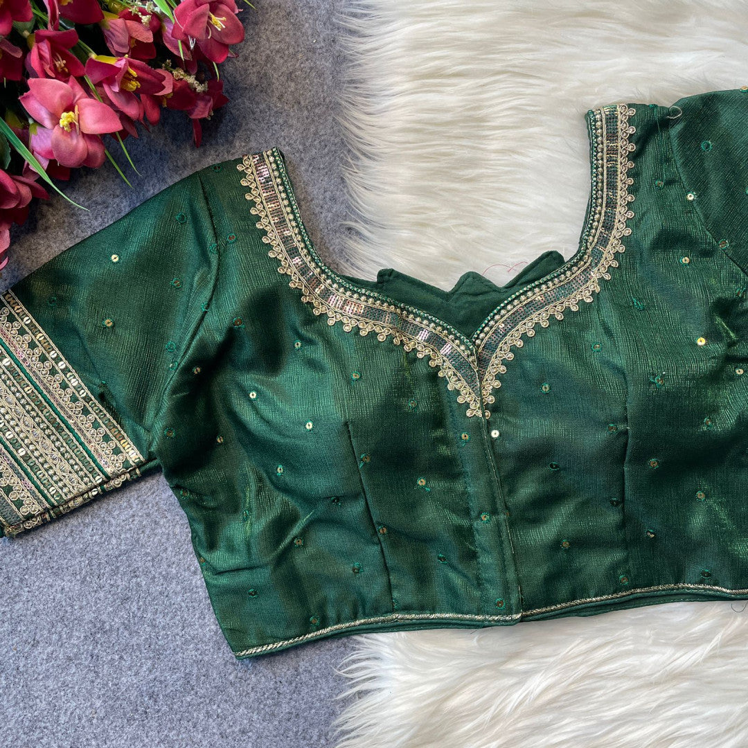Heavy milan silk with embroidery work green color blouse.