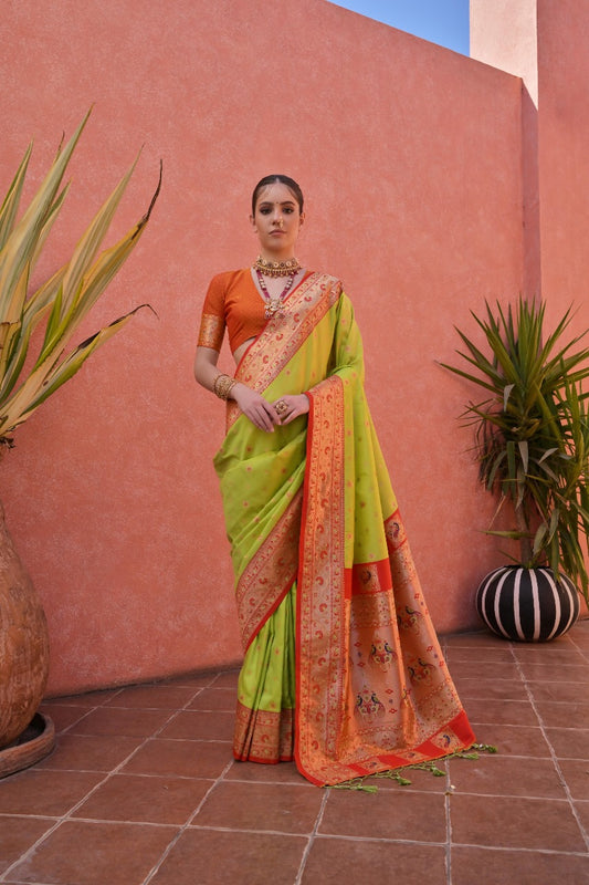 Parrot green premium banarasi silk paithani saree with zari weaving work.
